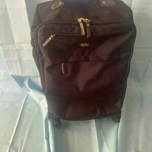 Share BRIC’S X-TRAVEL 21” Carry-On Spinner – Black Nylon Brown Trim – Italy